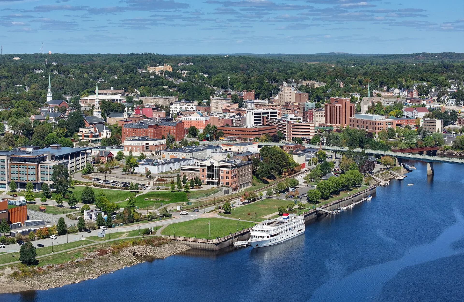 Wide view of downtown along Penobscot River in Bangor, Maine