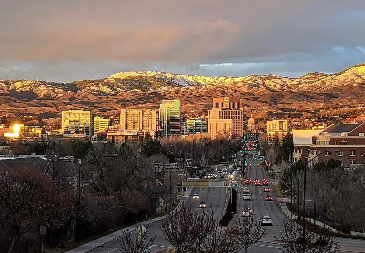 Downtown towers with foothills at golden hour in Boise, Idaho