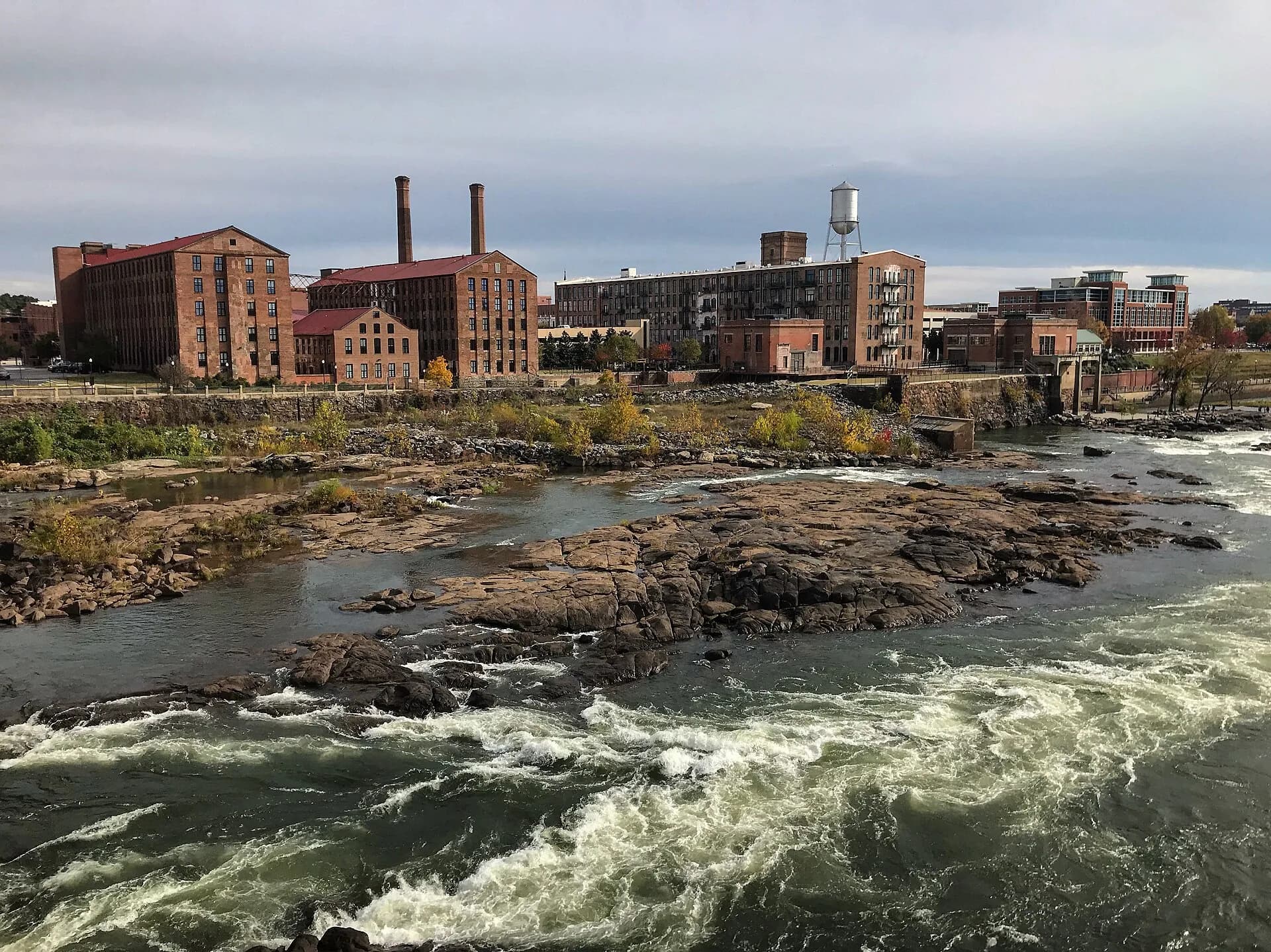 Downtown riverfront mills over Chattahoochee rapids in Columbus, Georgia