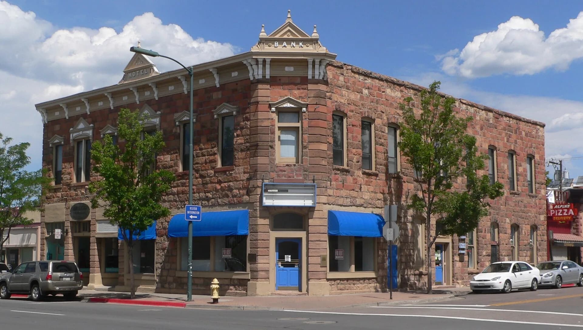 Historic sandstone Bank Hotel on downtown Flagstaff street corner in Flagstaff, Arizona