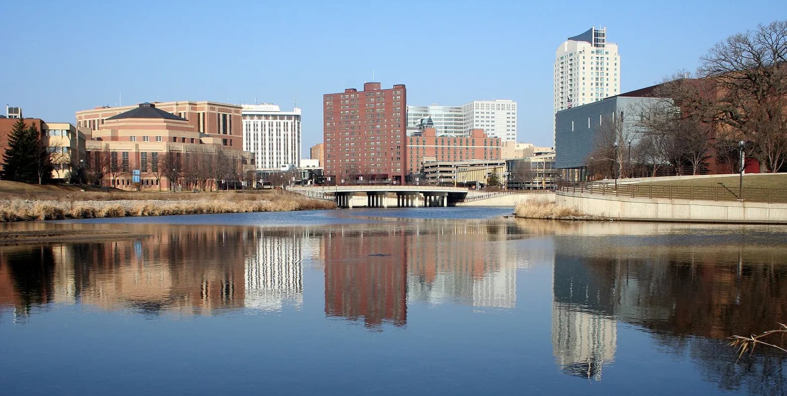 Downtown skyline reflected in river in Rochester, Minnesota