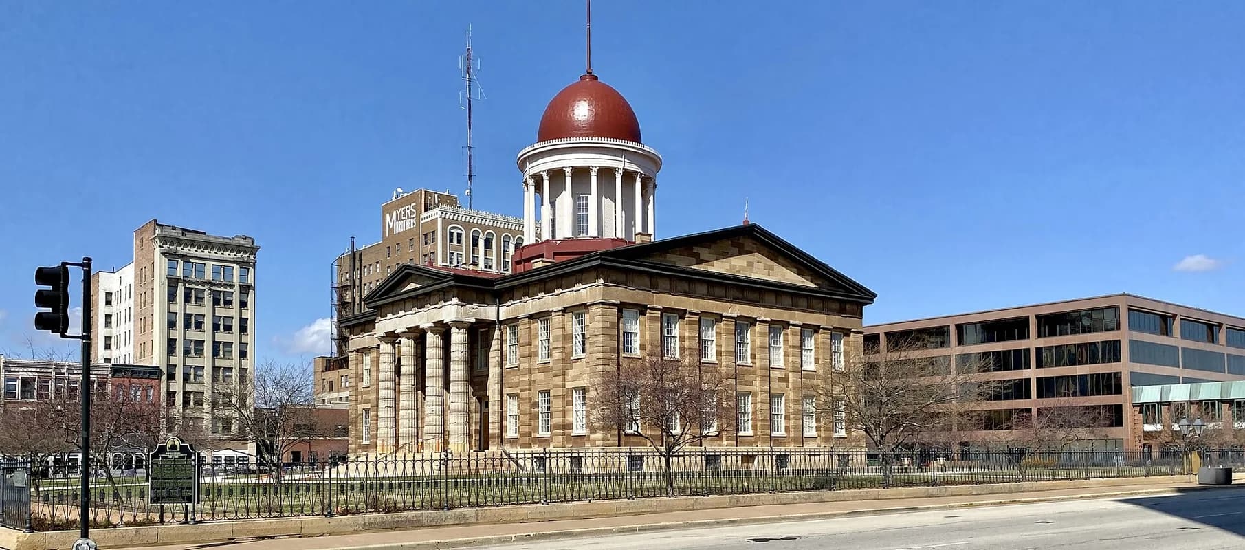 Old State Capitol with downtown buildings in Springfield, Illinois